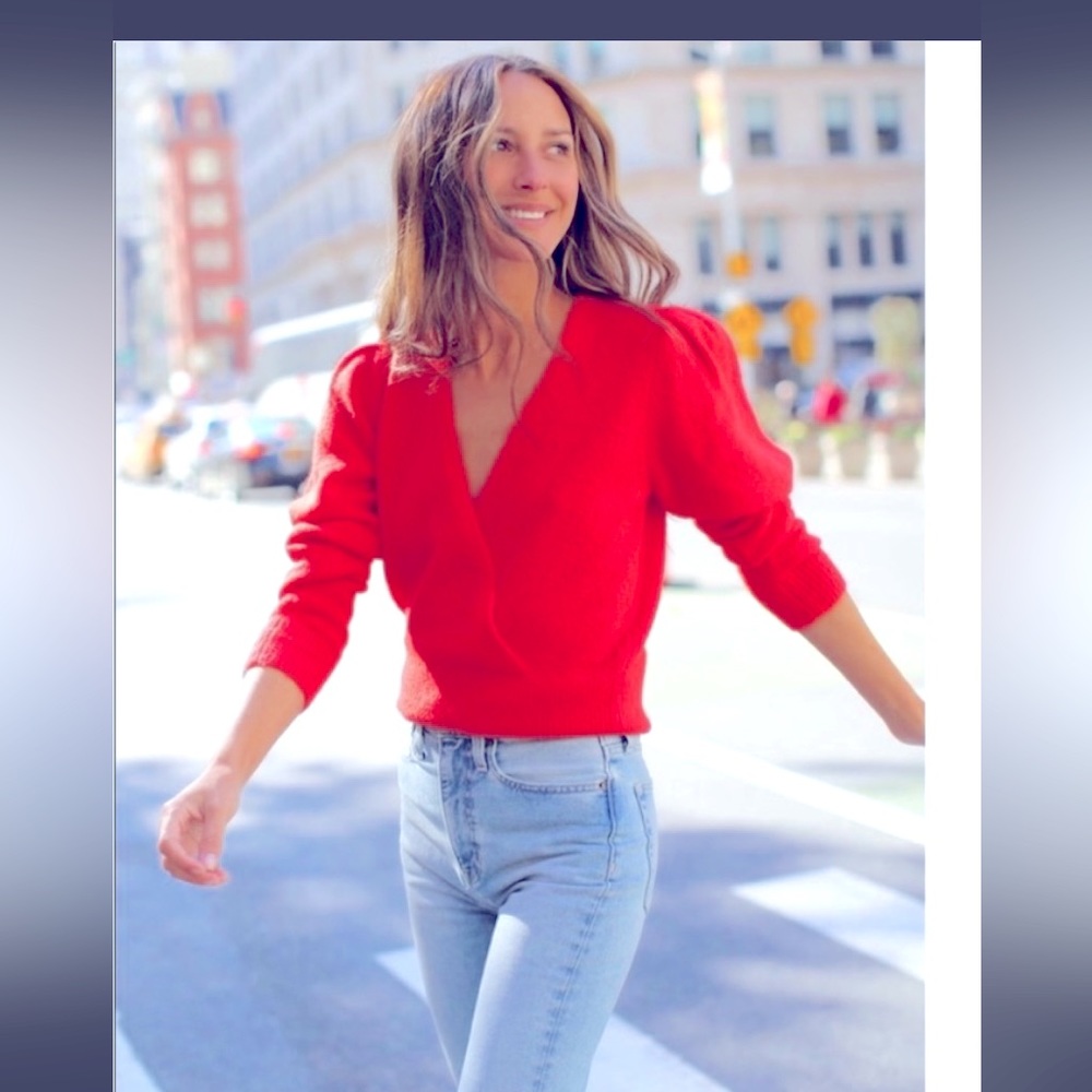 Something Navy red stretch knitted sweater featuring puff sleeves & v-neck.